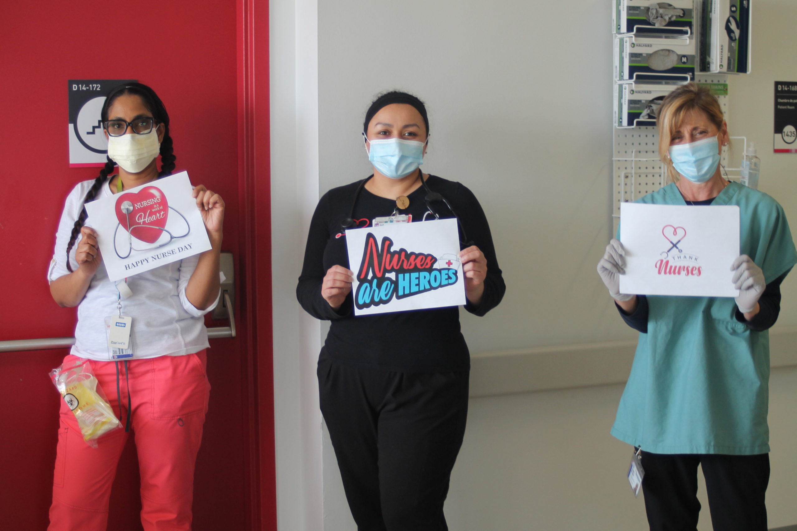 three nurses hold up appreciation signs for nurses week 2020